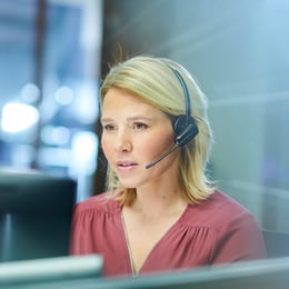 Hotline Employee speaking on headset