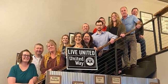 united way small business united group on staircase