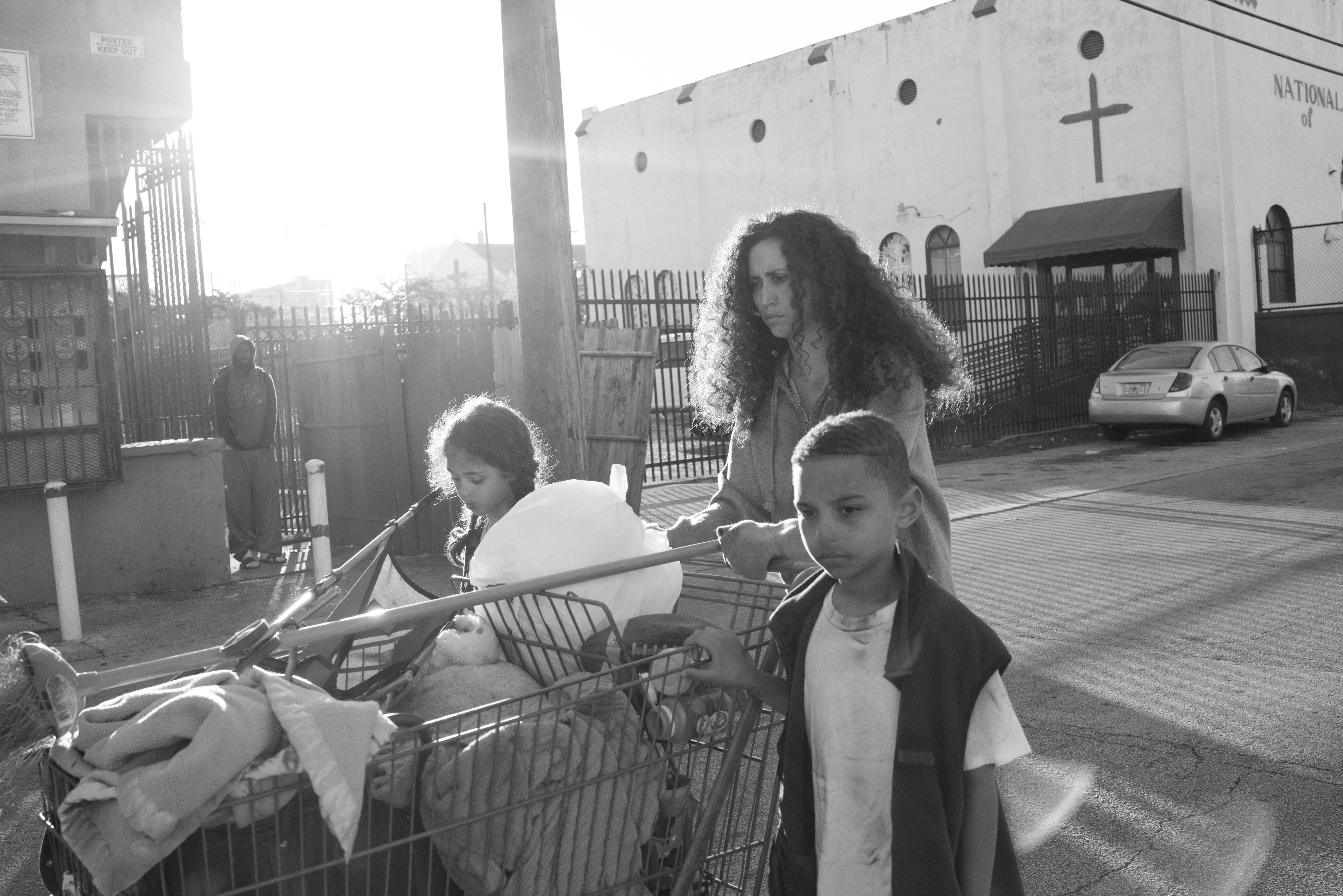 homeless family walking on the street